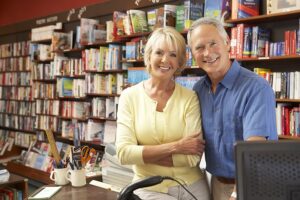 bigstock-Couple-running-bookshop-13904324